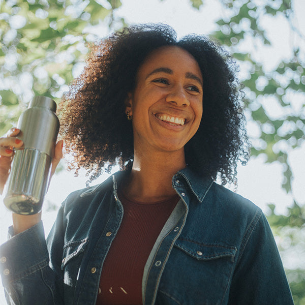 bring-your-own-party-kit-tumblers-and-cocktails-n2 16oz_rise_reflect_woman_smile_square.jpg
