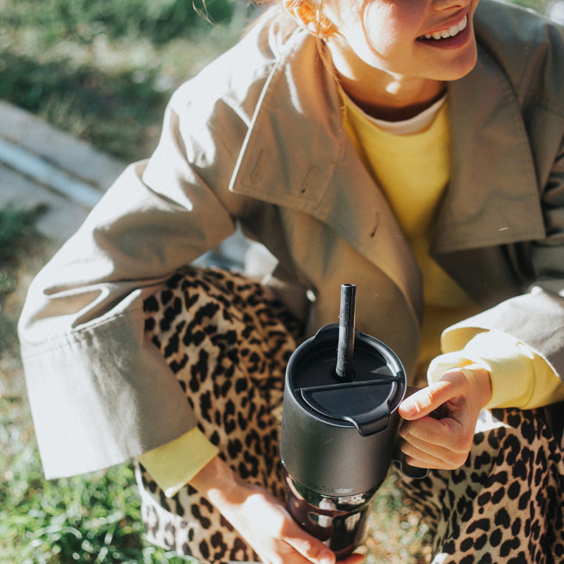 26oz-rise-tumbler-with-straw-lid-w5 26oz_rise_tumbler_black_woman_topview_square.jpg