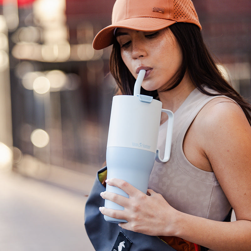 36oz-rise-tumbler-with-straw-lid-j1 36oz_rise_tumbler_straw_girl_sip_square.jpg