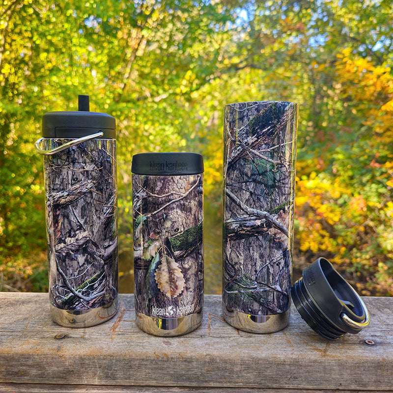 12oz-tkwide-with-cafe-cap-mossy-oak-l6 MossyOak_CountryDNA_collection_lineup_tkwide_railing_square.jpg