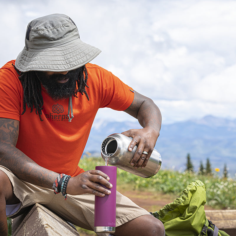 64oz-tkwide-with-loop-cap-y0 tkwide_64oz_bottle_backpacker_mountains_filling_square.jpg