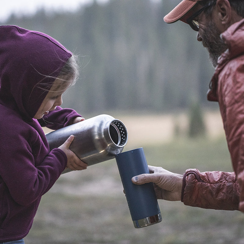 64oz-tkwide-with-loop-cap-y0 tkwide_64oz_bottle_girl_dad_filling_square.jpg